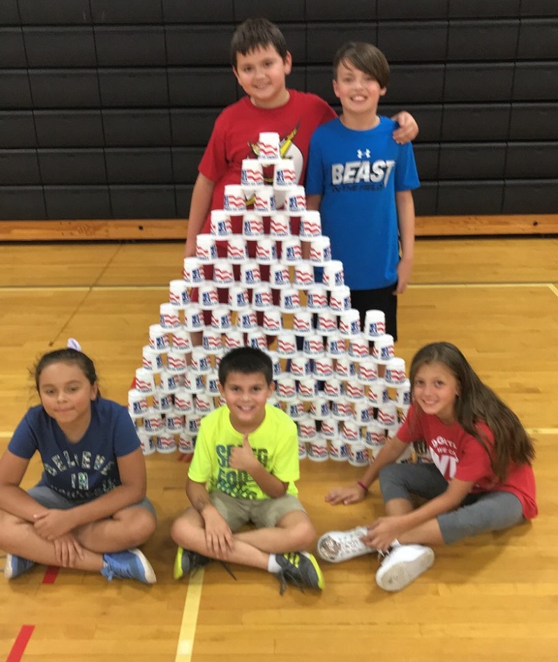 cardio cornhole stacking cup activity