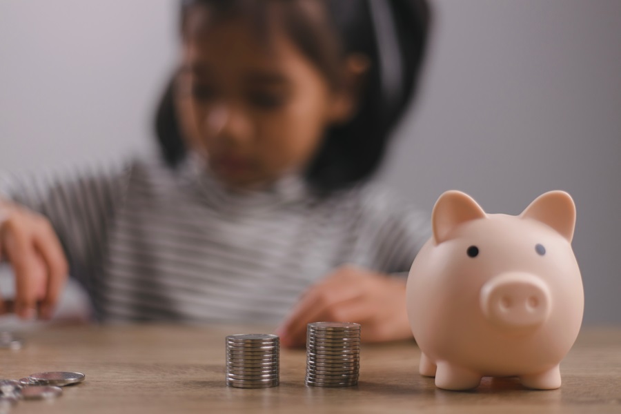Students learning financial literacy concepts through real-world activities